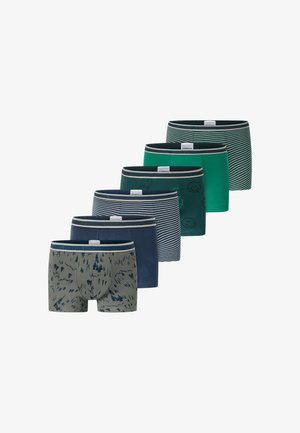 Zes paar herenboxershorts in groen, navy en grijstinten met strepen, smileys en abstracte patronen.