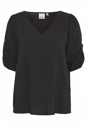 Blouse noire avec un décolleté en V, des manches courtes bouffantes avec un détail froncé et une coupe décontractée, fabriquée en tissu léger.