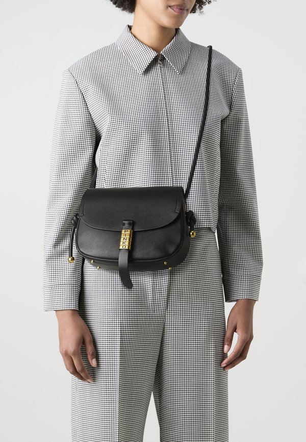 SADDLE MINI - Umhängetasche