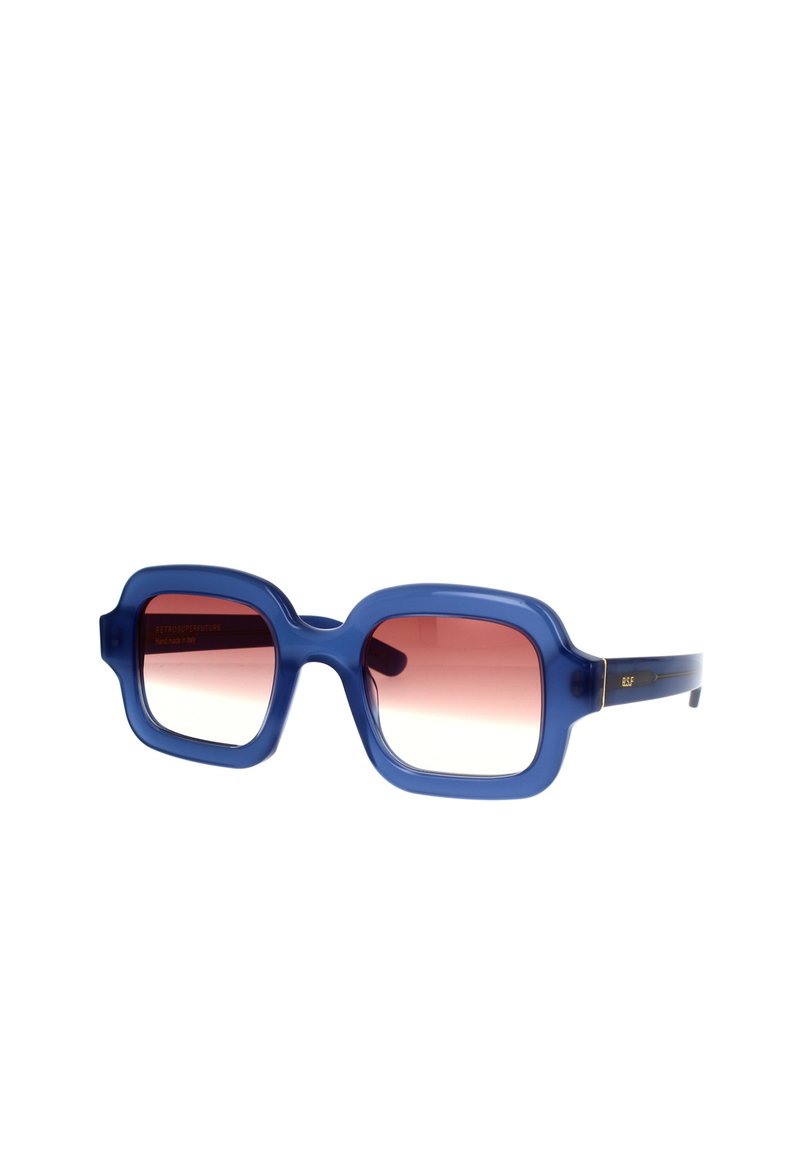 Occhiali da sole oversize blu con montatura trasparente, lenti rosa sfumate e hardware minimal. Design massiccio con una finitura liscia.