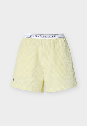 Κίτρινα και λευκά ριγωτά μποξεράκια Polo Ralph Lauren με ελαστική μέση και κουμπωτό καβάλο, απεικονιζόμενα σε απλό φόντο.