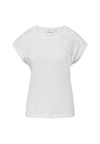 Weißes Baumwoll-T-Shirt mit rundem Ausschnitt und kurzen Ärmeln, das auf der linken Schulter mit einem grauen, gestickten Blumenmuster verziert ist.