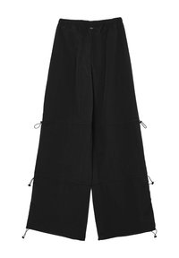 Pantalons larges noirs en matière légère. Dotés d'une taille élastique et de cordons de serrage à l'ourlet.
