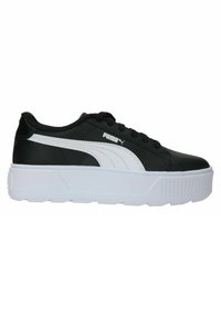 Sneaker in pelle nera con accenti bianchi, suola piatta bianca spessa, punta rotonda e lacci neri. Presenta il logo Puma sul lato.