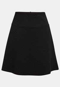 Jupe noire évasée avec un motif discret de petits pois blancs et une taille haute, présentée sur fond blanc.