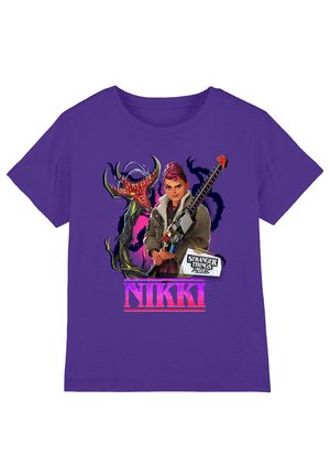 Purple shirt with graphic of a character named Nikki holding a weapon, a red monster, and "Stranger Things 1985" text.