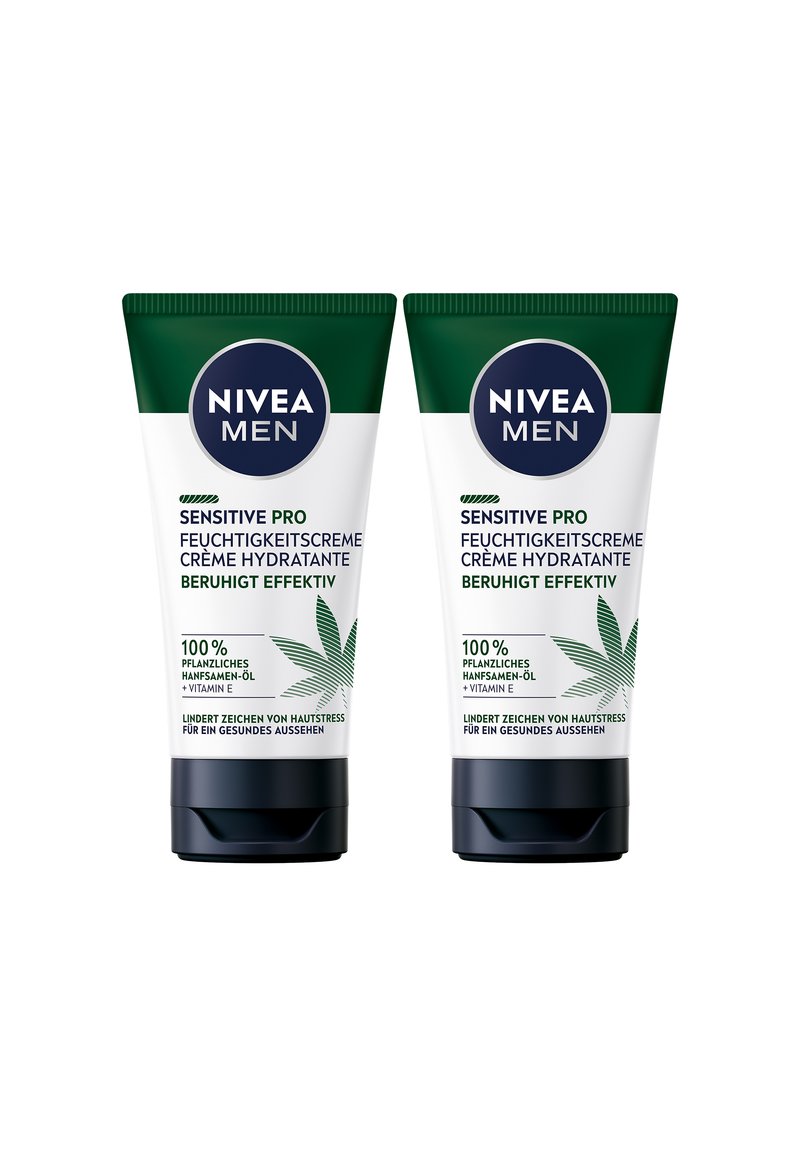 Two green and white tubes of Nivea Men Sensitive Pro moisturizing cream, featuring a cannabis leaf graphic and black caps.