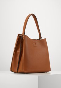 L.CREDI FILIPPA - Sac à main - cognac