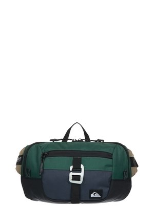 Green, black, and gray multi-pocket bag with a top handle, adjustable strap, and buckle closure; durable fabric with a textured finish.