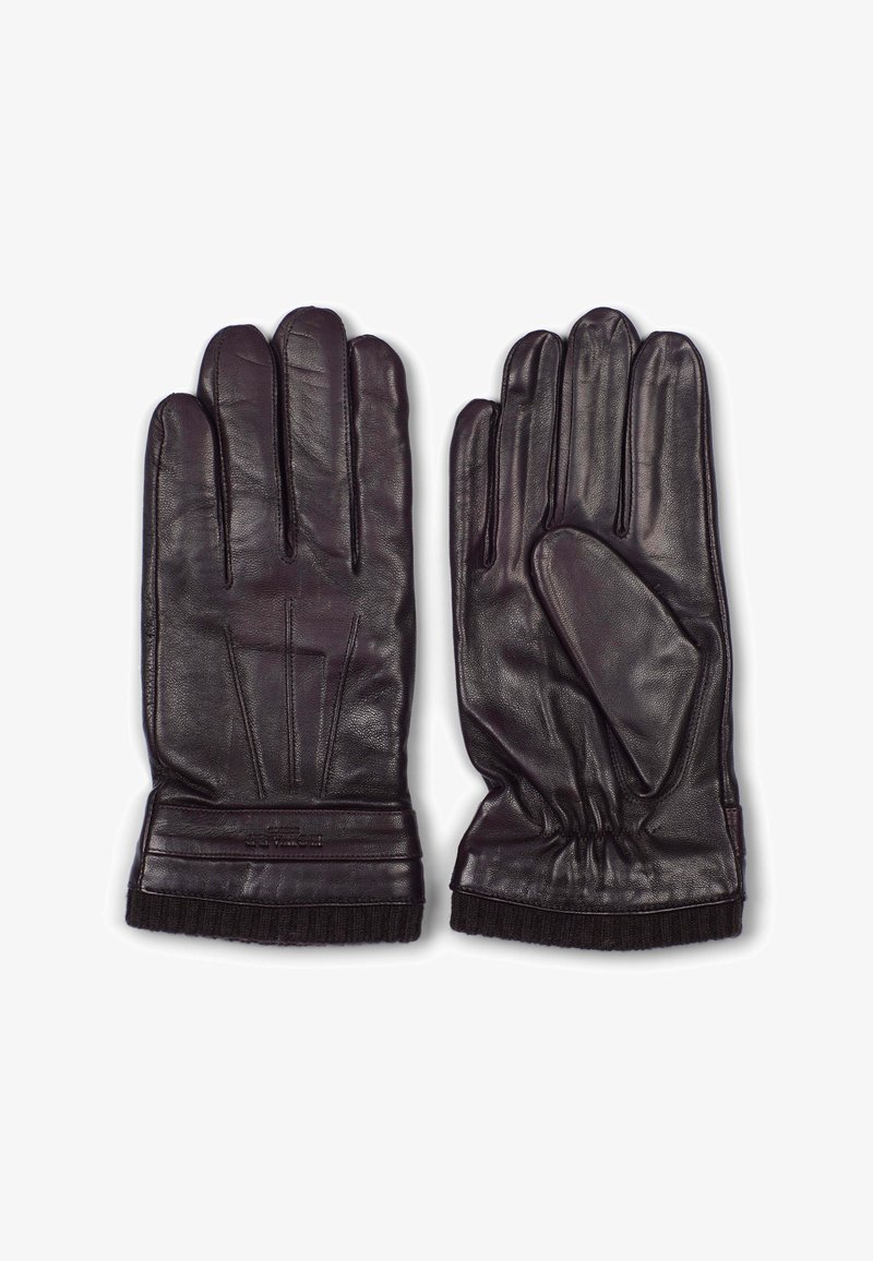 Mørkebrun lærhansker med en tettsittende design, med ribbet mansjett og tre pyntelinjer på baksiden. Glatt tekstur og tett passform.