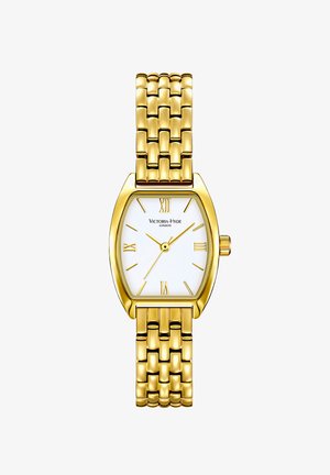 Guldtonet ur med rektangulært urkasse, hvid urskive og romerske tal som markører. Har et sammenkoblet metalarmbånd og en struktureret overflade.