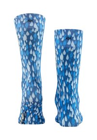Chaussettes montantes bleues, avec un motif de gouttes de pluie blanches. Fabriquées en matériau doux, avec une texture lisse et des bords renforcés.