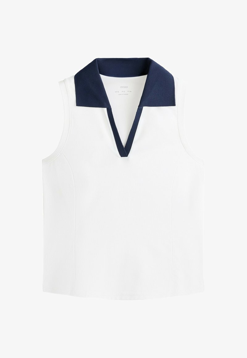 Haut blanc sans manches avec col en V bleu marine profond, coupe ajustée, sans attaches ni motifs visibles.