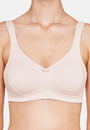 Light pink bra with molded cups, wide straps, and a small central bow. Smooth fabric with subtle texture and reinforced edges.