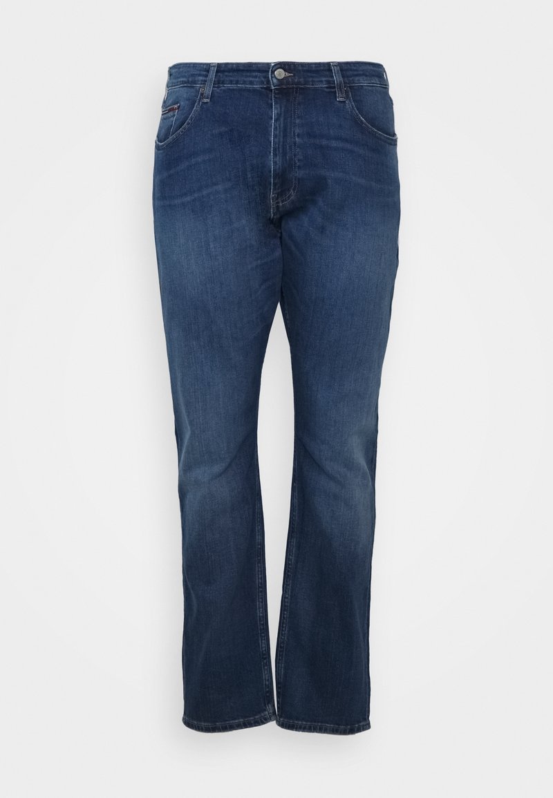 Jeans rectos de mezclilla ligera en azul oscuro. Cuentan con cierre de botón, cinco bolsillos y un sutil desgaste cerca de las rodillas.