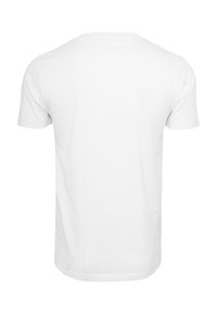 Hvid kortærmet T-shirt lavet af bomuldsstof, med rund halsudskæring og en glat overflade. Ingen grafik eller mønstre på bagsiden.