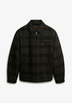 Karierter Blazer in Schwarz und Braun mit Kragen, Frontreißverschluss, Seitentaschen und einer Brusttasche. Hergestellt aus strukturiertem Stoff.
