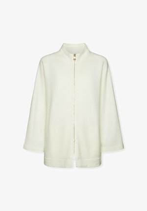 Chaqueta de cremallera de color crema con cuello alto, mangas largas y dobladillo recto sobre un fondo blanco.