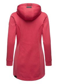 Pink, long-sleeve jacket with a hood, made of ribbed fabric. Features a fitted design and a label on the lower hem.