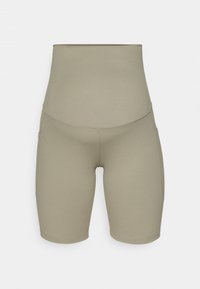 Vyötäröltä korkeavyötäröiset pyöräilyshortsit hillityssä oliivinvihreässä värissä. Valmistettu joustavasta kankaasta, jossa on sivutaskut ja sileät, saumattomat reunat.