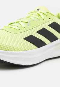 adidas Performance GALAXY  - Road running shoes - pulse lime/core black/linen green