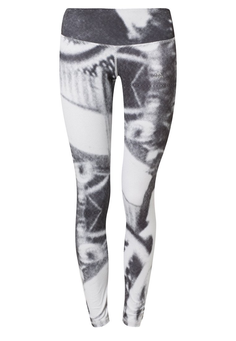 Czarno-białe legginsy z teksturowanym wzorem, z abstrakcyjnymi grafikami. Wysoki stan i dopasowany krój, idealne do aktywności fizycznej.