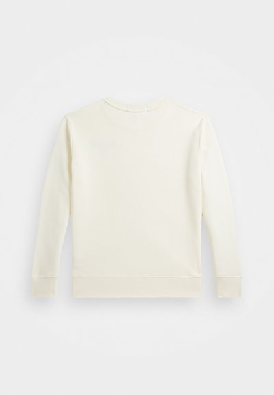 Sudadera color crema con mangas largas, cuello redondo y puños y dobladillo de canalé. Tejido suave con detalles de costura mínimos.
