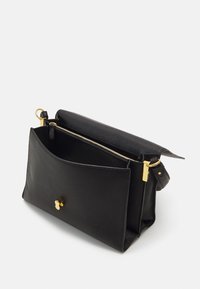 Coccinelle BINXIE - Τσάντα χειρός - noir