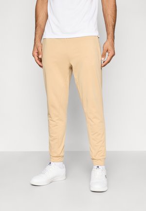 Pantalones deportivos - tan