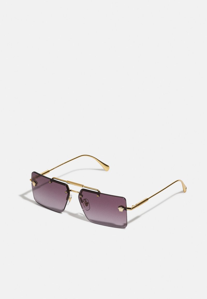 Rectangular sunglasses with gradient purple lenses. Gold metal frame, featuring detailed accents at the temples and a sleek design.
