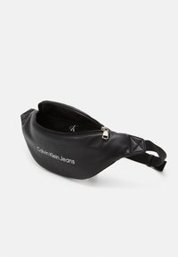 Calvin Klein Jeans MONOGRAM SOFT WAISTBAG UNISEX - Torbica za okoli pasu - black