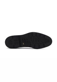 Semelle de chaussure en caoutchouc noir avec une surface texturée, présentant des semelles circulaires et rectangulaires pour l'adhérence et la stabilité. Taille marquée comme 40.