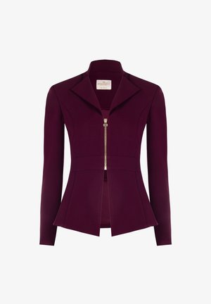 Blazer ajusté de couleur violet foncé avec manches longues, grands revers et une fermeture éclair dorée centrale, présentant une légère évasement au niveau de la taille.