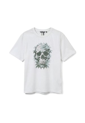 White short-sleeve T-shirt with a detailed skull graphic surrounded by green fern leaves on the front.