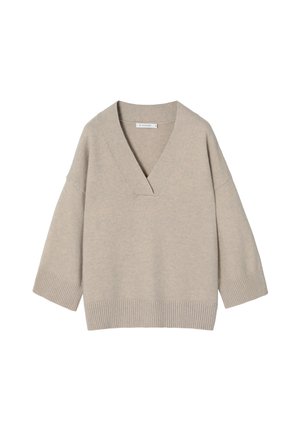 Beige oversized knit sweater with a deep V-neckline, 3/4 sleeves, and ribbed hem. Soft texture and lightweight material suitable for layering.