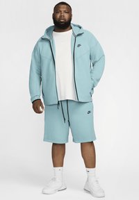 Nike Sportswear TECH - Zip-up sweatshirt - denim turquoise black