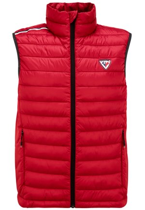 Gilet rembourré rouge avec col montant, design matelassé, fermeture éclair à l'avant et deux poches latérales. Présente un patch logo sur le côté supérieur gauche.