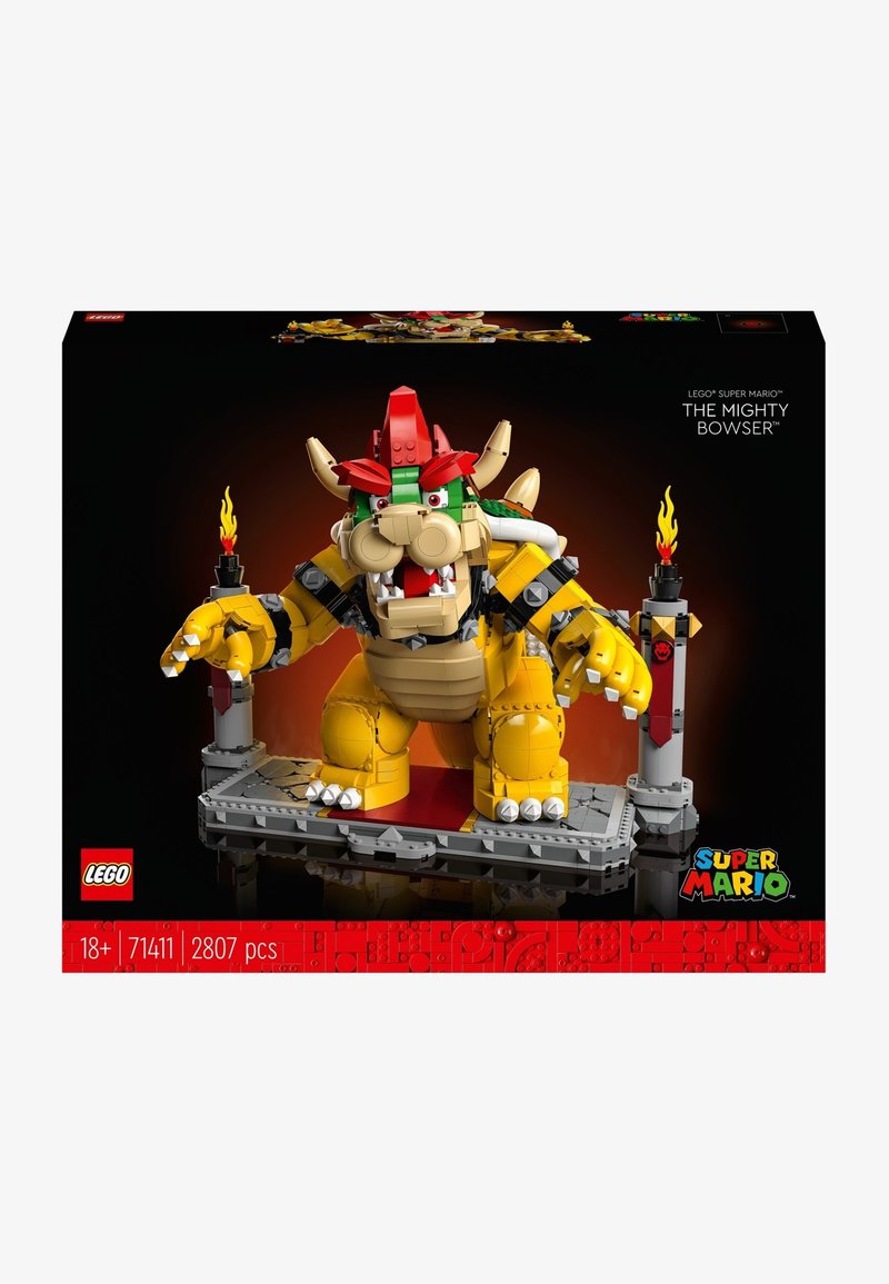 LEGO model of Bowser with yellow, red, and green elements. Features a detailed face, claws, a throne-like base, and flame accents.