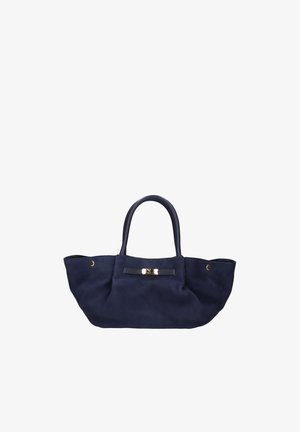 Navy blue suede tote bag with two handles, wide base, gold-tone clasp detail, and button accents on sides.