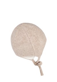 Beige soft fabric baby bonnet with ear flaps and a tied chin strap, shown on a white background.
