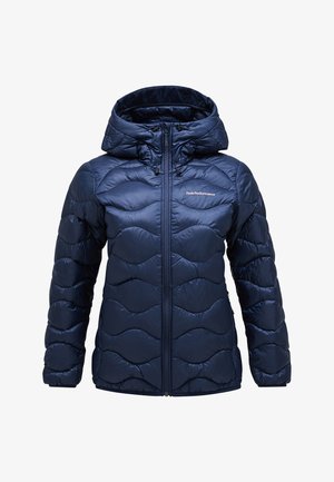 Navy blue puffer jacket with a hood, featuring wavy quilted pattern, front zipper closure, and Peak Performance logo on the chest.