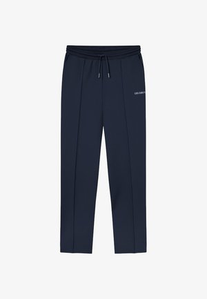 Dunkelblaue Freizeithose mit vorderen Nahtdetails, elastischem Bund mit Kordelzug, Seitentaschen und kleinem weißem "LES DEUX"-Logo am rechten Oberschenkel.