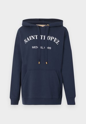 Sweat à capuche bleu marine avec poche kangourou à l'avant et texte blanc "SAINT TROPEZ MICHAEL KORS" sur la poitrine, avec cordons de serrage aux extrémités dorées.