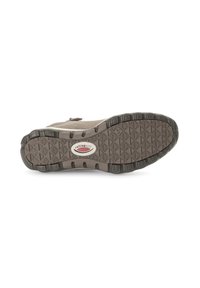 Gray low-top shoe with a textured rubber sole, featuring a zigzag pattern and accent logo. Upper material is soft and flexible.