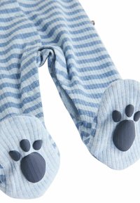 Striped blue fabric footed pajamas with snap closure; paws design on the soles with black accents, soft texture, and ribbed cuffs.