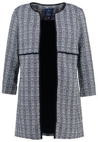 Cappotto a righe blu navy e bianco con maniche lunghe, apertura frontale, tessuto testurizzato e bordi e tasche a contrasto.