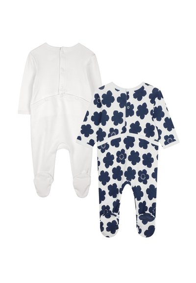 Deux bodies pour bébé : l'un est blanc uni avec des boutons, l'autre est à motifs avec des fleurs marines sur fond blanc. Tissu doux, manches longues.
