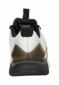 Weißer Sportschuh mit schwarzem Innenfutter, ausgestattet mit einem glatten Stoff-Obermaterial, einer Gummisohle und einem braunen durchsichtigen Absatzakzent.