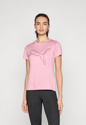 Rosa T-skjorte med korte ermer laget av bomull, med en svart Puma-logo i midt sprang i sentrum. Rund halslinning, stoffet ser jevnt ut.