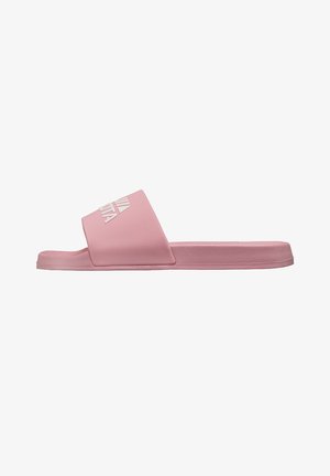 Pink slide sandal with a textured surface, wide strap, and a white logo on the upper. Flat sole and minimalistic design.
